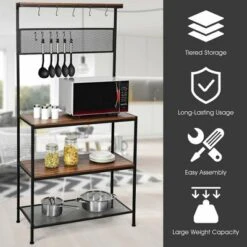 Costway 4-Tier Kitchen Bakers Rack Microwave Oven Stand Industrial W/Hooks & Mesh Panel -Baxton Studio Store GUEST 96ef8627 557a 47f9 8f14 9ecfa1ee8faf